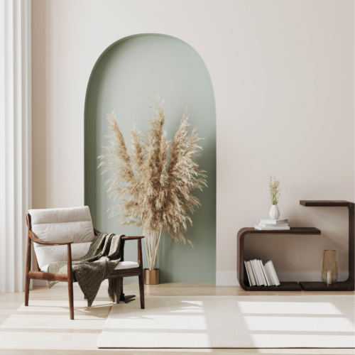 A luxury office seating, with a chair, plant and coffee table.