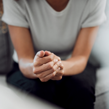 A supportive counselling session where a person reflects on their emotions, symbolizing the challenges FIFO (Fly-In Fly-Out) workers and their families face. The image represents resilience, connection, and mental well-being.